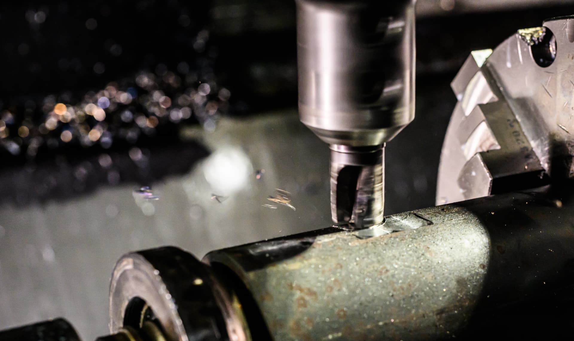 Cutting tool machining a connection into a steel shaft
